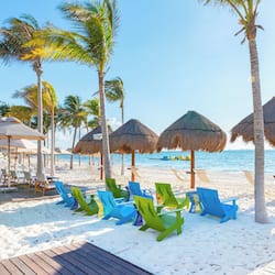 On the beach, white sand, free beach cabanas, sun loungers