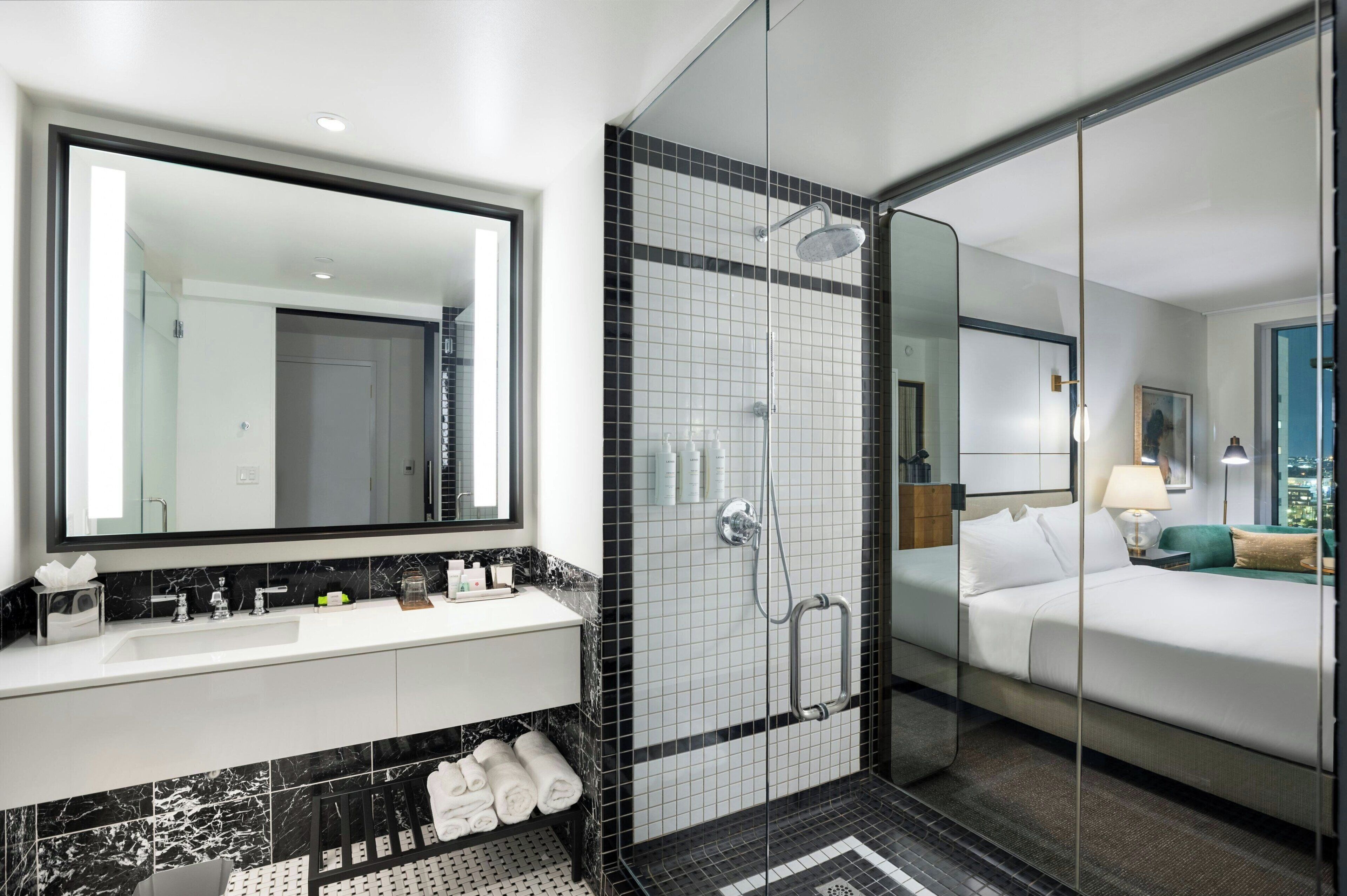 room, 1 king bed | bathroom | designer toiletries, hair dryer, bathrobes, towels