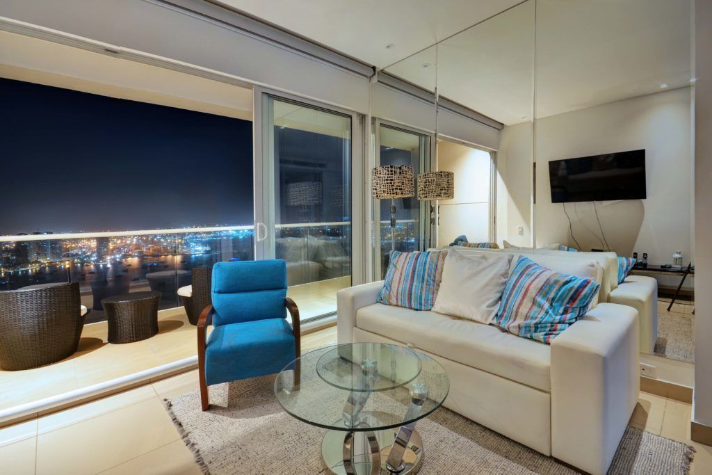 Apartment, 2 Bedrooms, Beach View, Beachfront | Living room | 50-inch flat-screen TV with cable channels, TV