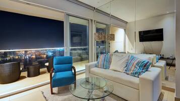 Apartment, 2 Bedrooms, Beach View, Beachfront | Living room | 50-inch flat-screen TV with cable channels, TV