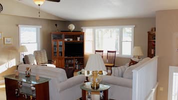 TV, DVD player, foosball, books