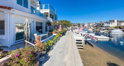 Large home at Center of Island, water views, garage, fire pit, dock, AC, linens