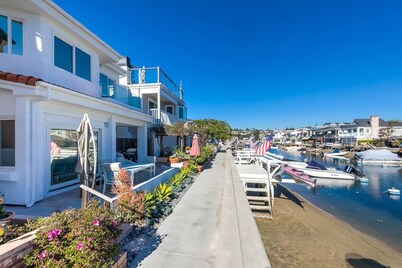 Large home at Center of Island, water views,  garage, fire pit, dock, AC, linens