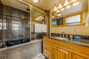 Bathtub, jetted bath, eco-friendly toiletries, hair dryer