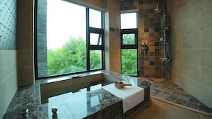 A modern bathroom with a large window, a bathtub, and a shower area. - Maple House Riverside (Dongshan)