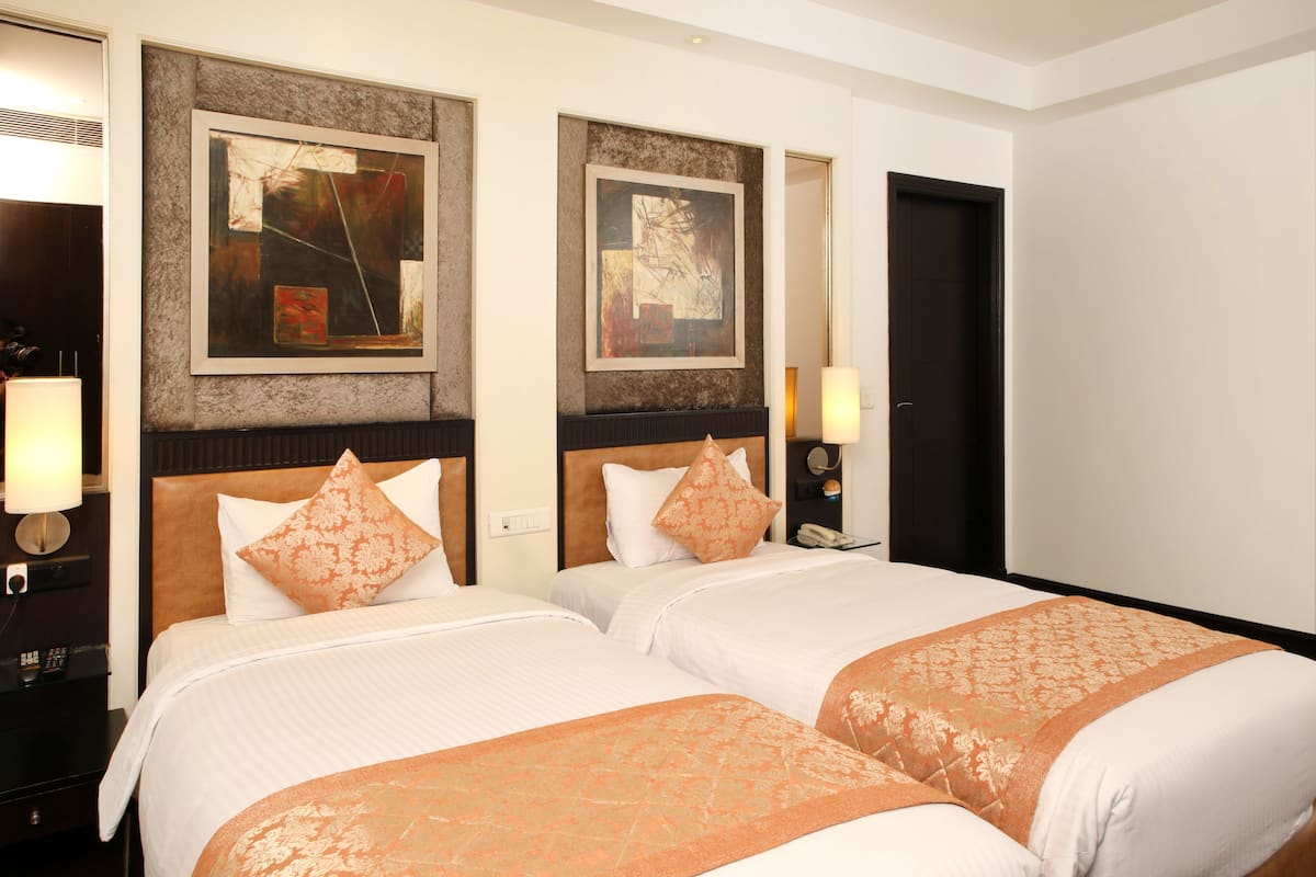 Quarto executivo | 1 quarto, roupas de cama premium, frigobar, cofres nos quartos