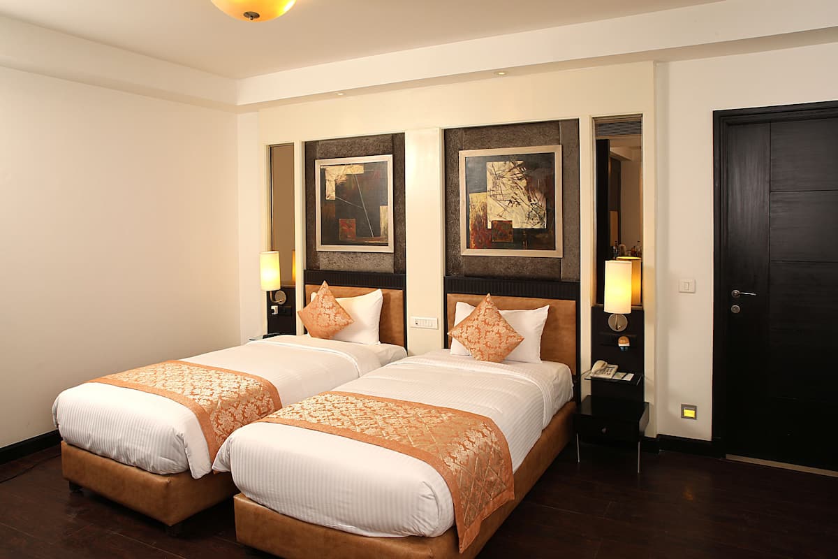 Quarto premium | 1 quarto, roupas de cama premium, frigobar, cofres nos quartos