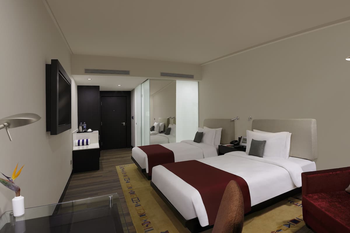 Premium bedding, pillowtop beds, minibar, in-room safe