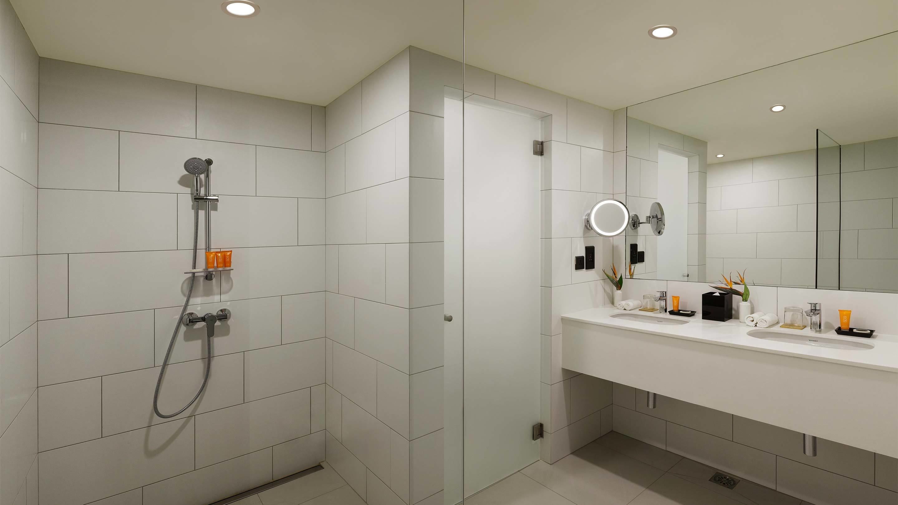 luxury studio suite, 1 queen bed, pool view | bathroom | shower, free toiletries, bathrobes, slippers