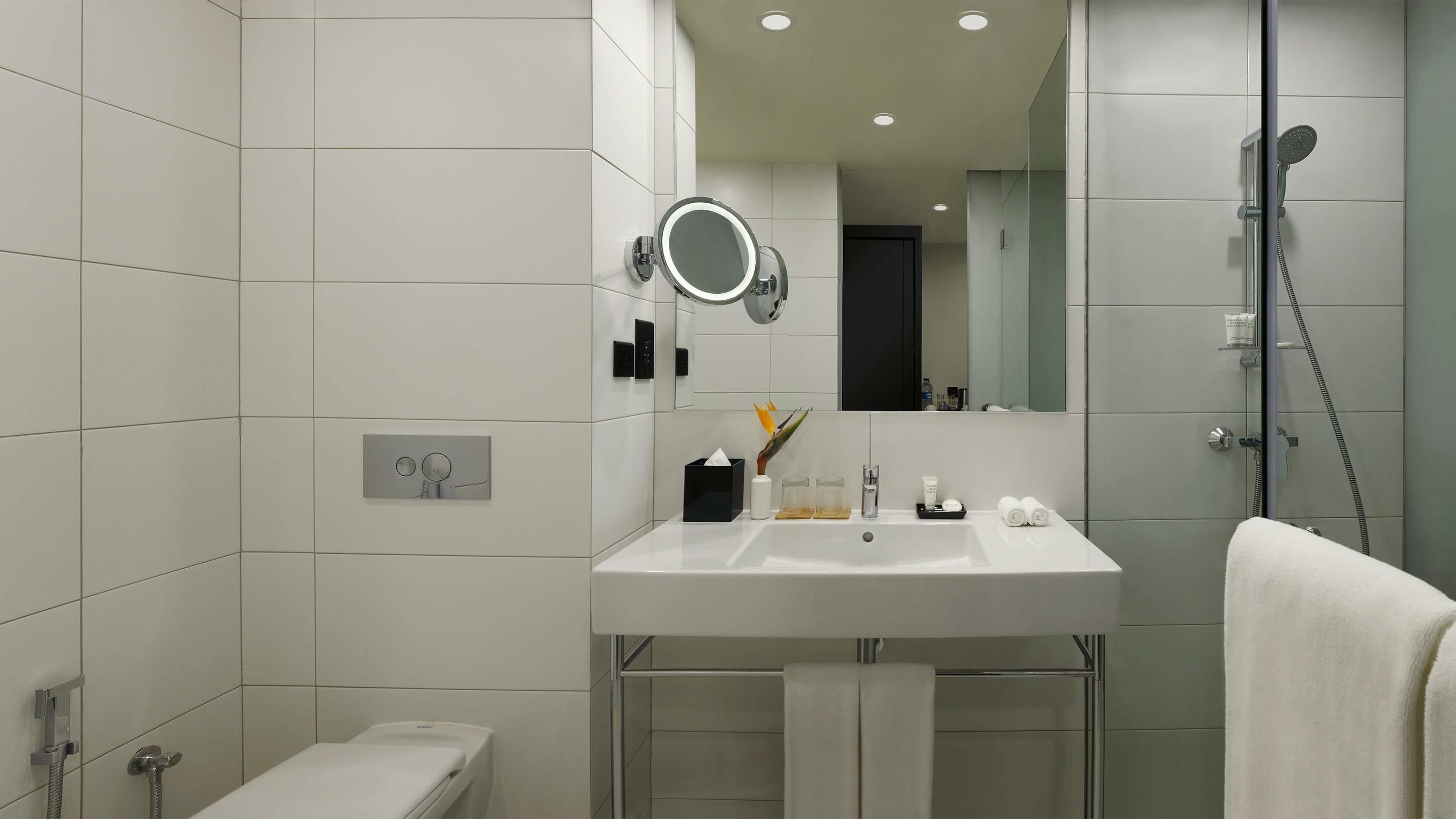 shower, free toiletries, bathrobes, slippers