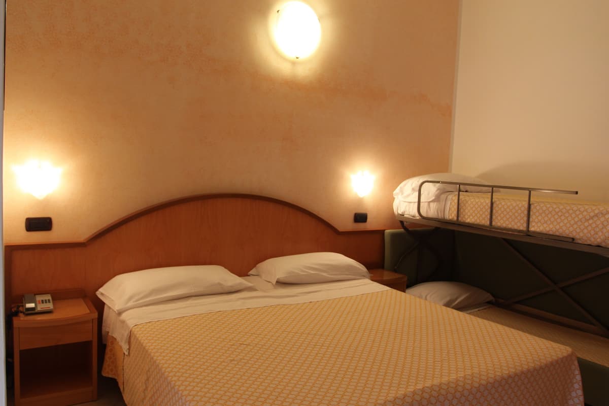 Quadruple Room, Balcony | Minibar, in-room safe, desk, free WiFi