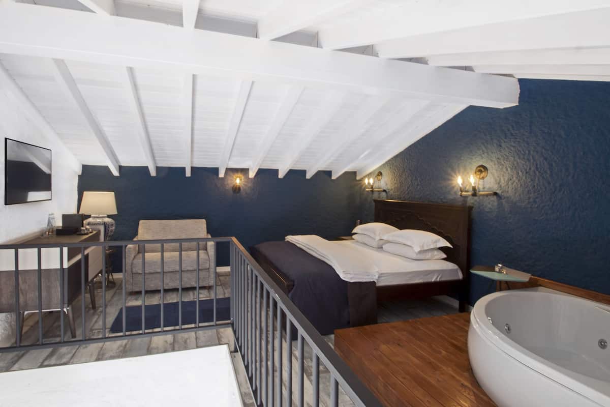 Luxe maisonnette, 1 slaapkamer, bad | Luxe beddengoed, een minibar met enkele gratis items