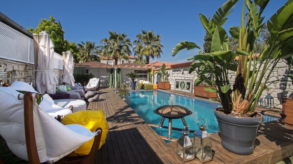 Outdoor pool, pool umbrellas, pool loungers