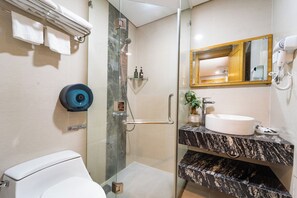 Shower, rainfall showerhead, designer toiletries, hair dryer