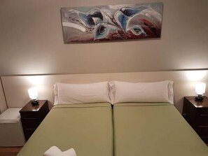 Desk, free WiFi, bed sheets