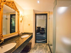 Shower, free toiletries, hair dryer, slippers