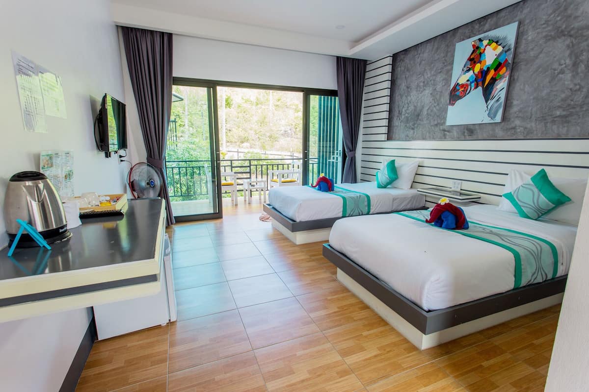 superior room, pool view | 1 bedroom, minibar, in-room safe, blackout curtains