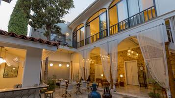 Honeymoon Suite, 1 Queen Bed, Partial Sea View | Minibar, in-room safe, desk, iron/ironing board