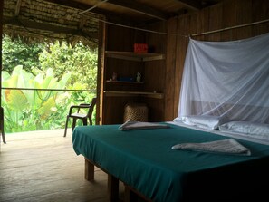 Cofres nos quartos, roupa de cama