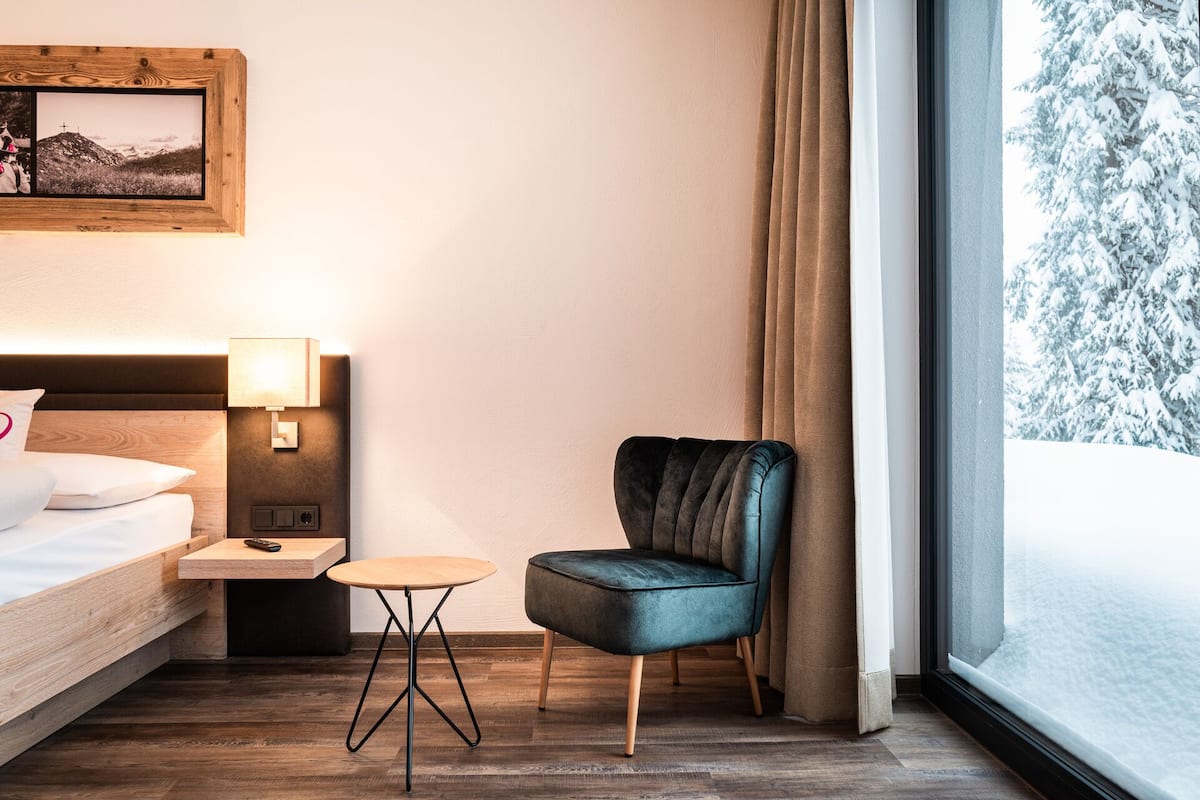 Superior Double Room | Living area | Flat-screen TV, heated floors