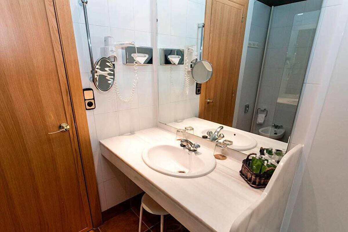 free toiletries, hair dryer, slippers, towels