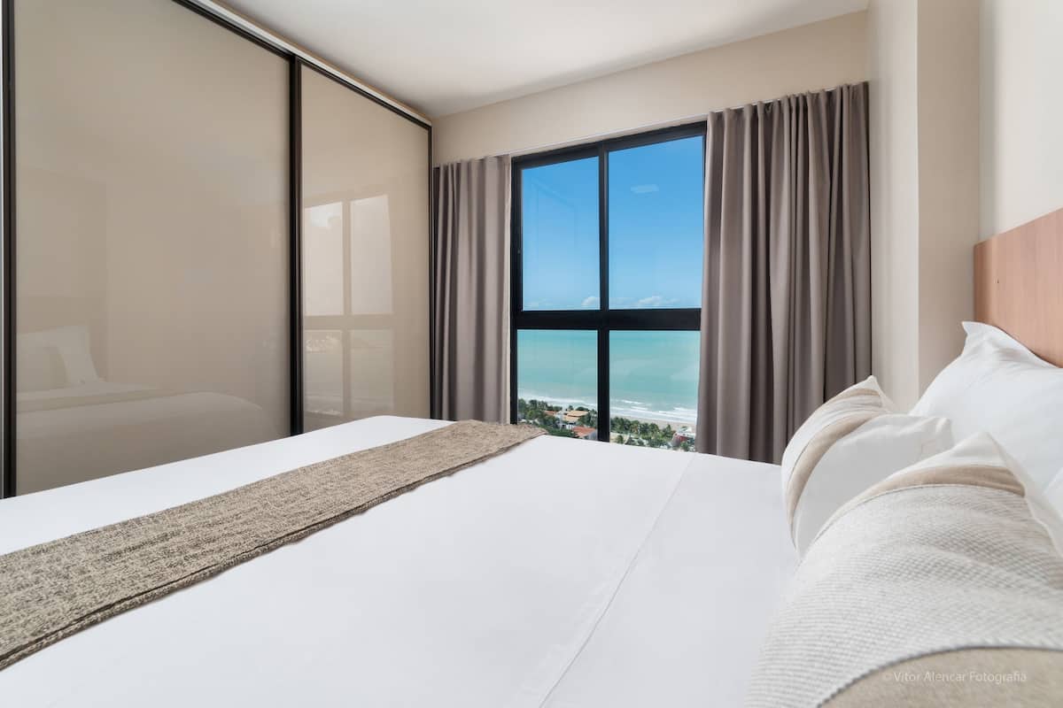 2 habitaciones, cortinas blackout y tabla de planchar con plancha 
