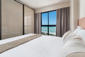 Apartment, 2 Bedrooms, Balcony, Sea View | 2 bedrooms, blackout drapes, iron/ironing board, free WiFi