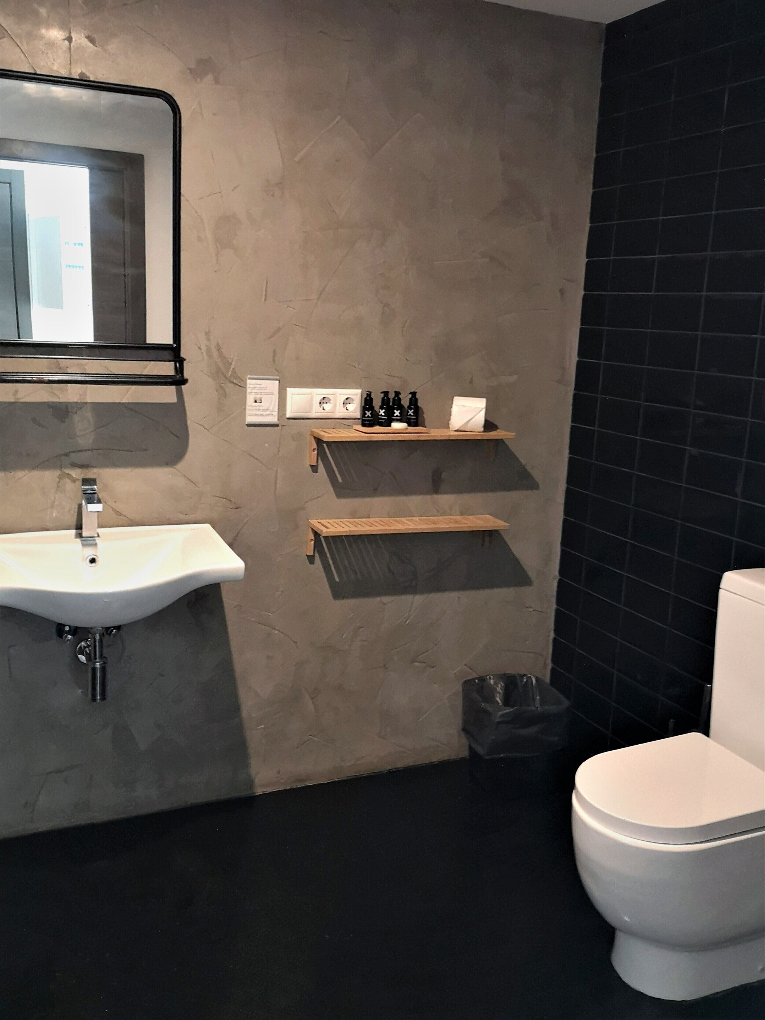 deluxe family suite | bathroom | shower, designer toiletries, hair dryer, bidet