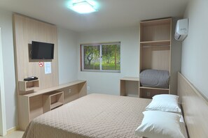 Minibar, desk, blackout drapes, iron/ironing board
