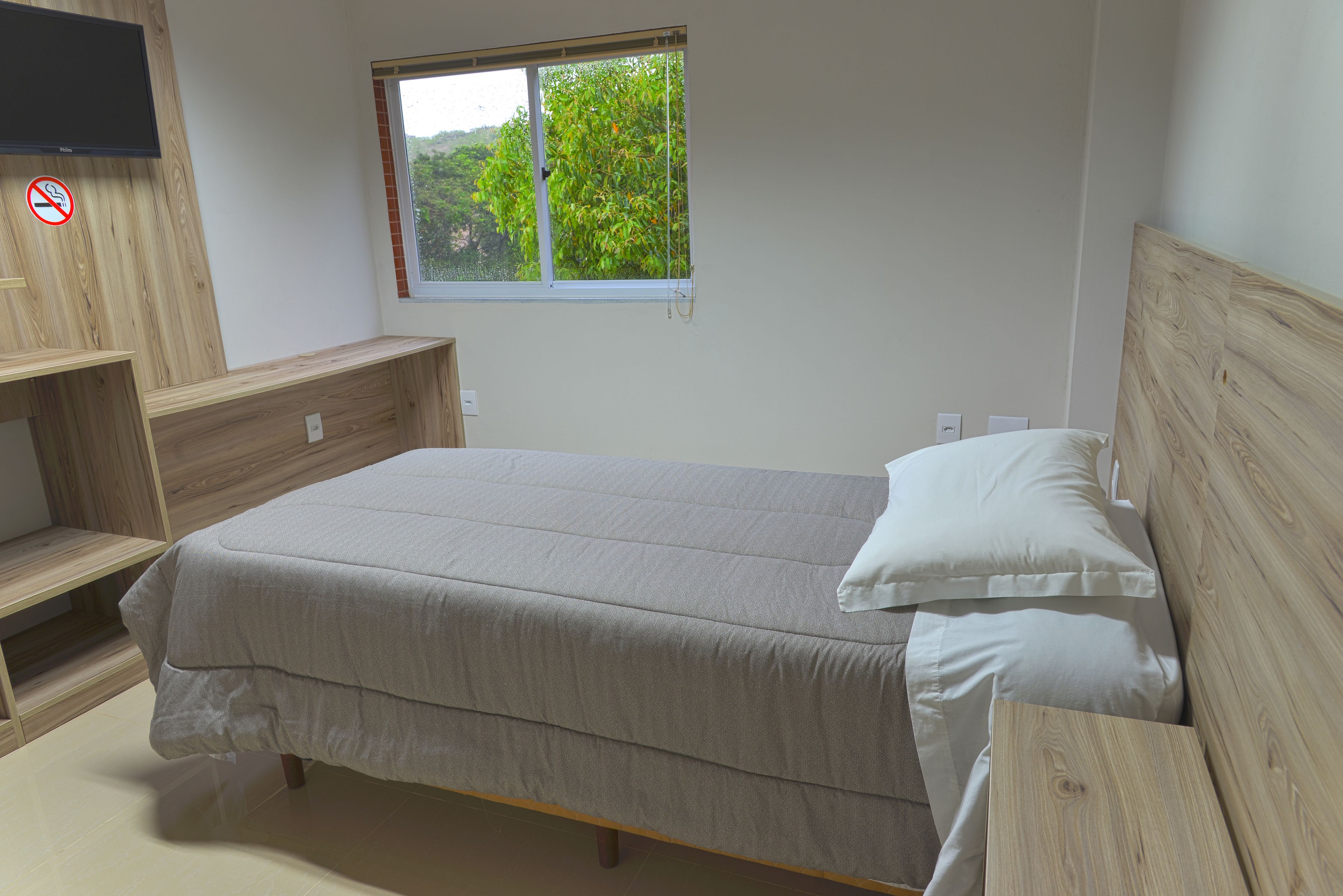 minibar, desk, blackout curtains, iron/ironing board