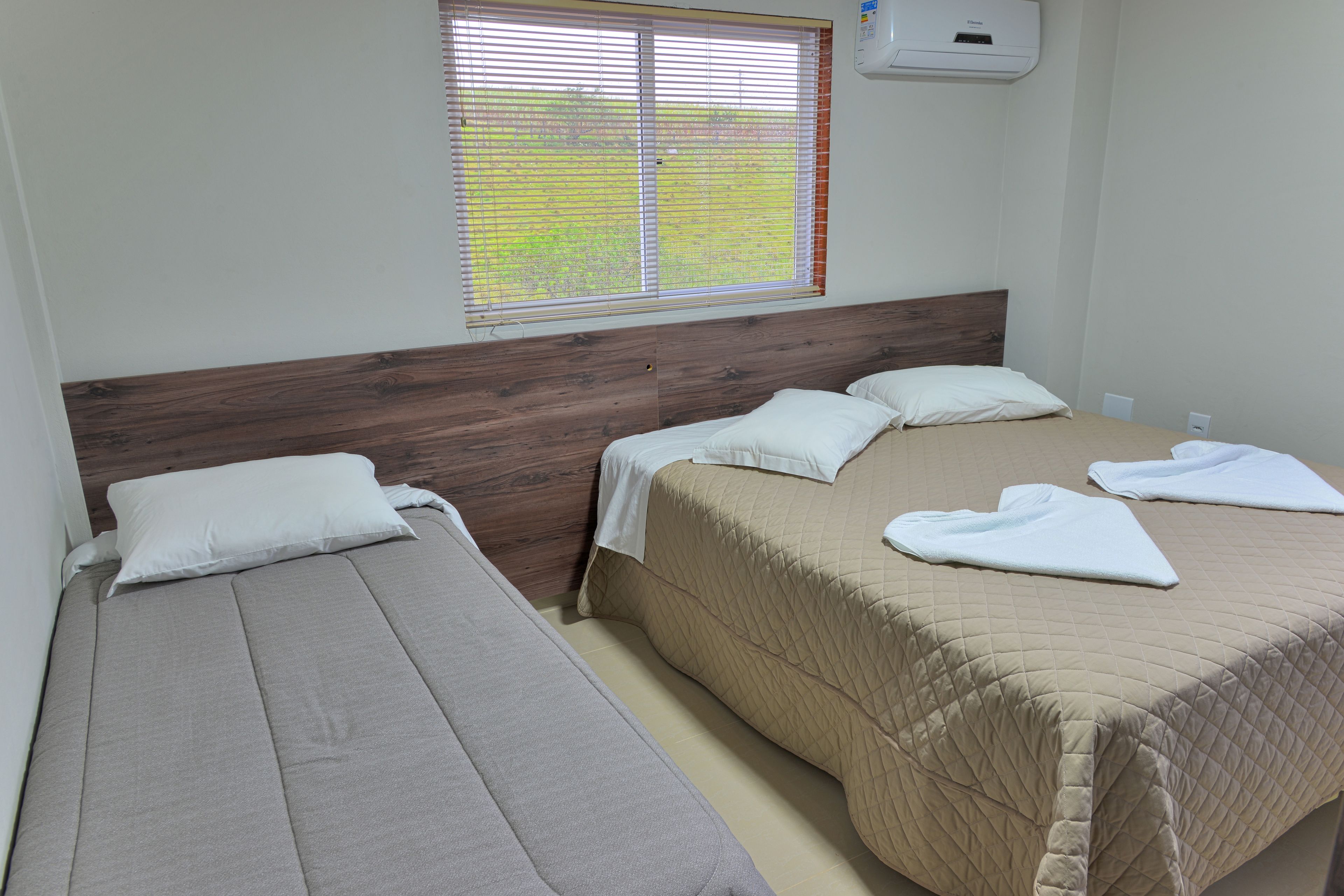 triple room | minibar, desk, blackout curtains, iron/ironing board