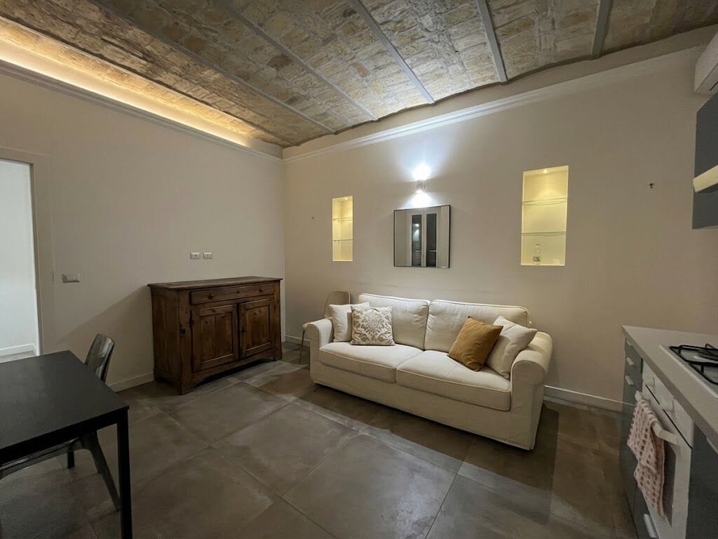 Family Apartment | Living area | 14-inch LED TV with cable channels