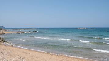 En la playa y toallas de playa