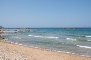 On the beach, beach towels