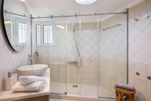 Shower, hair dryer, towels, soap