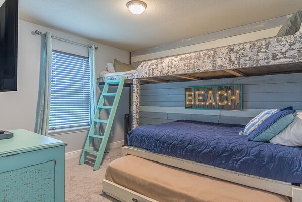 A bunk bed with a 'BEACH' sign, a ladder, a desk, and a window with blinds. - Cottage 3BR-2.5B walking distance to public beach access - Rosemary Alys 30a (Inlet Beach)