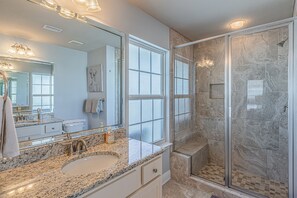 Shower, hair dryer, towels, soap