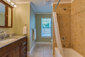 Combined shower/tub, hair dryer, towels, soap