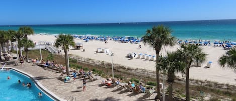 On the beach, sun-loungers