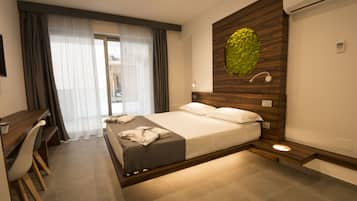 3 habitaciones, ropa de cama de alta calidad y minibar