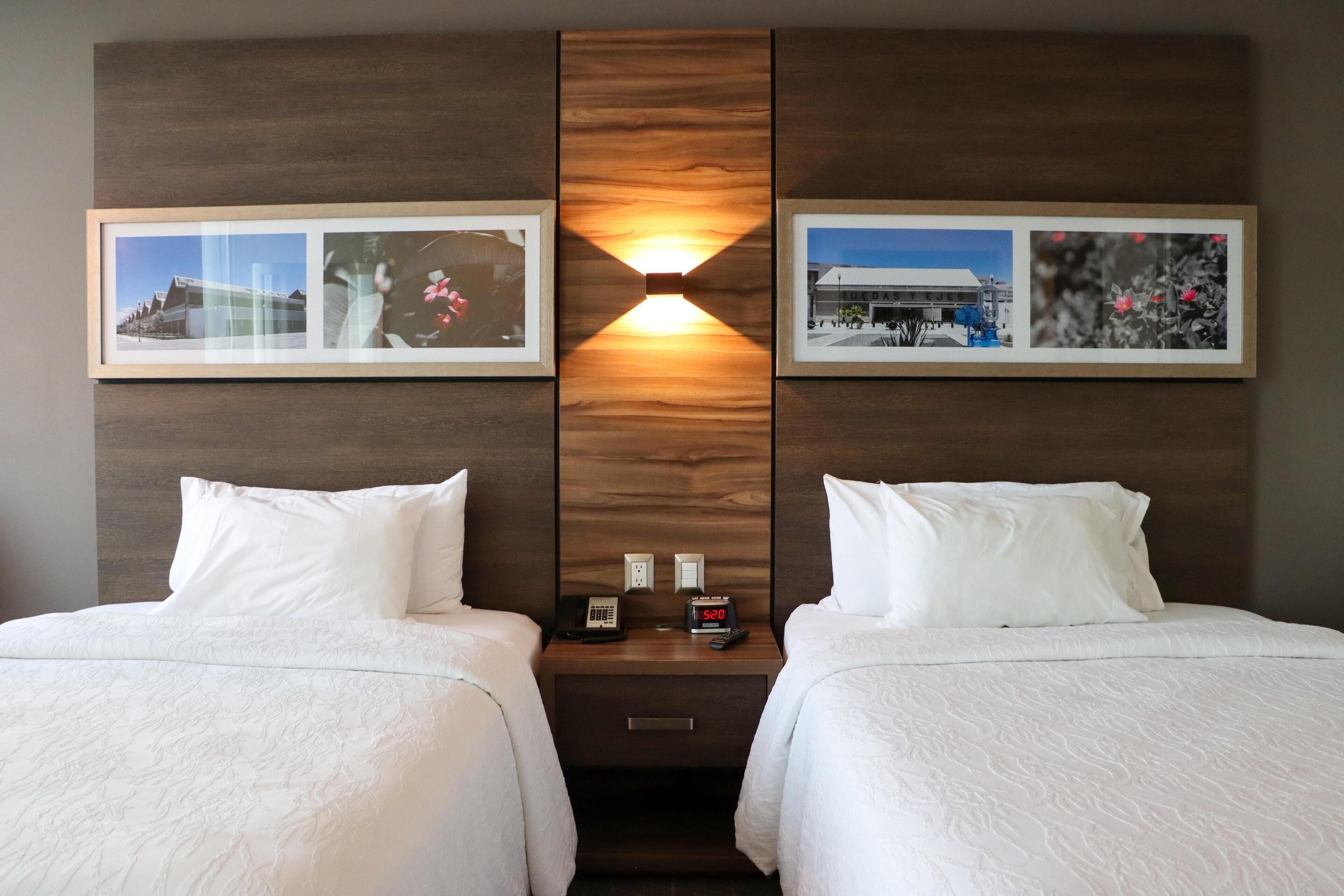 deluxe room, 2 double beds | in-room safe, desk, blackout curtains, iron/ironing board