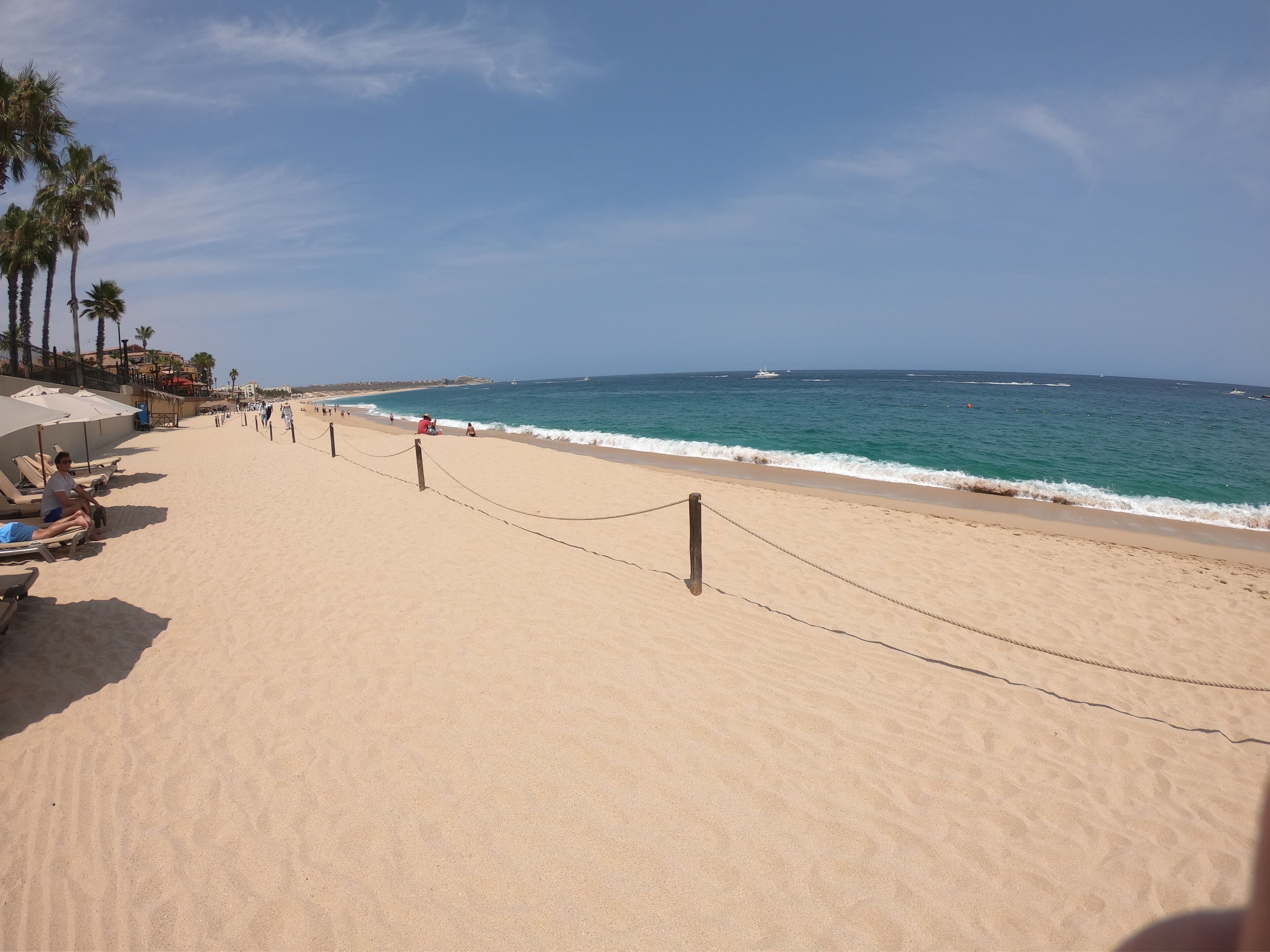 On the beach, sun loungers, beach towels