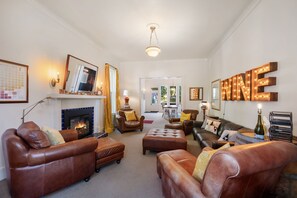 Smart TV, fireplace, DVD player, books