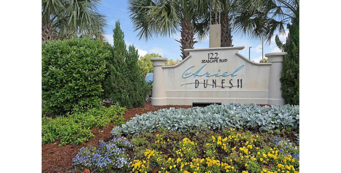 A sign for Ariel Dunes II on Seascape Blvd.