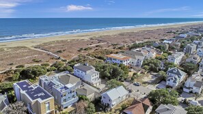 On the beach, sun loungers, beach towels