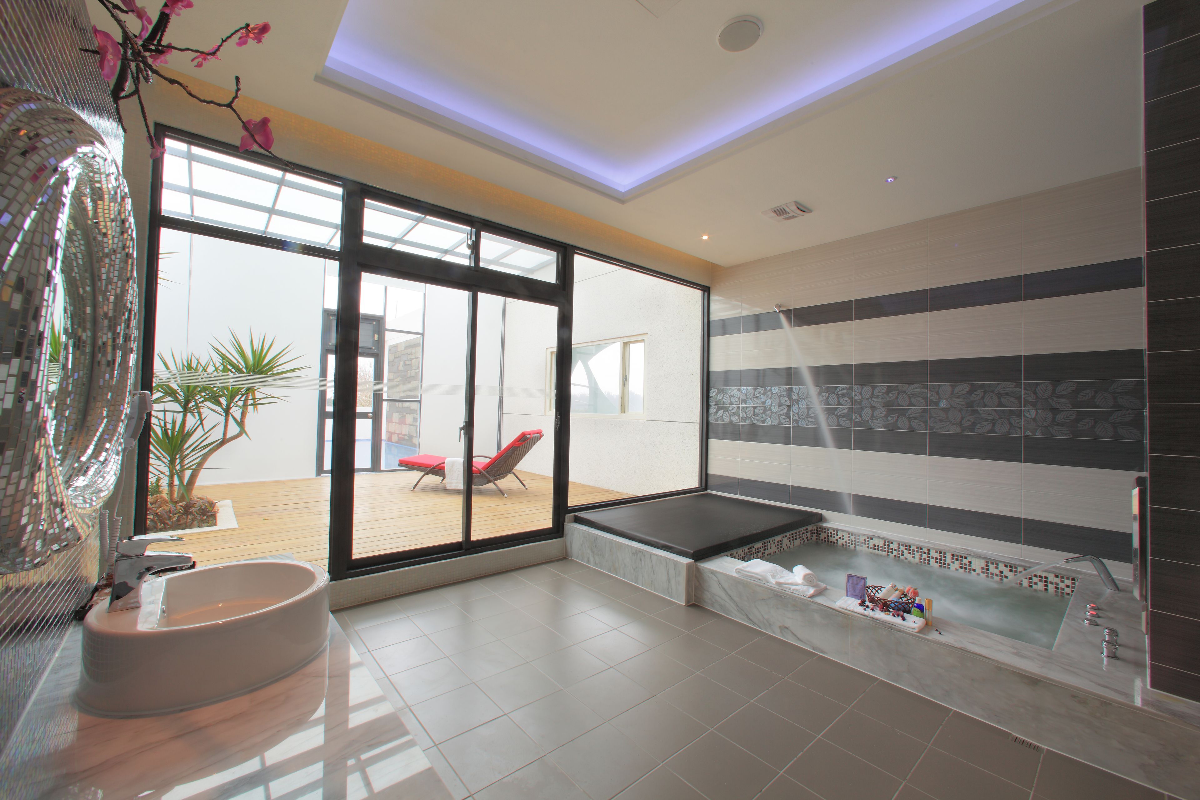 luxury double room, 1 king bed, patio (21:00 check in) | bathroom | separate bathtub and shower, jetted bath, free toiletries, hair dryer