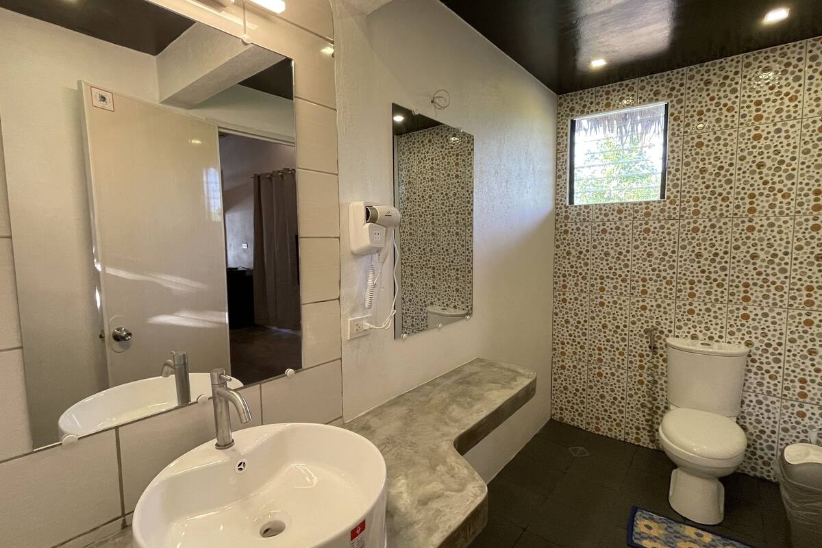 family quadruple room, multiple beds | bathroom | shower, free toiletries, hair dryer, bidet