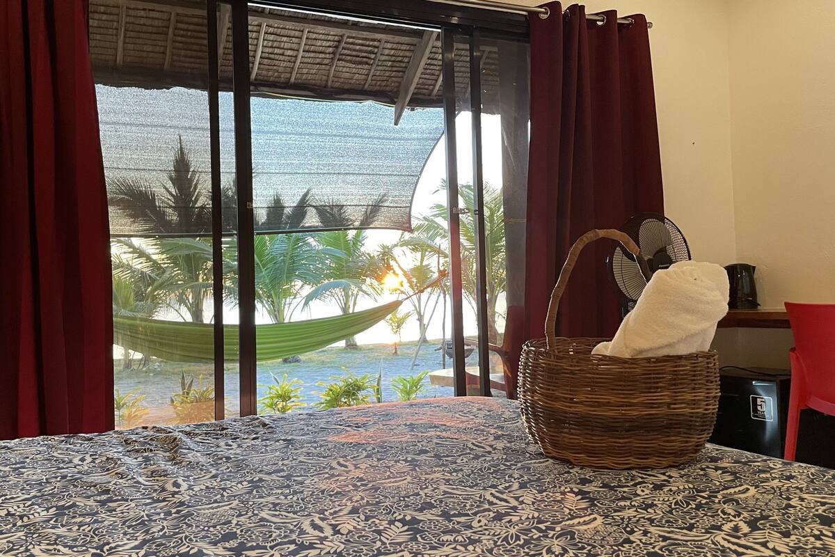 superior cabin, 1 king bed, beachfront (aircon) | 1 bedroom, soundproofing, iron/ironing board, free wifi
