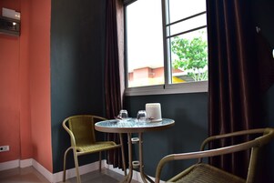 Standard Double Room | Living area | 32-inch flat-screen TV with satellite channels, TV