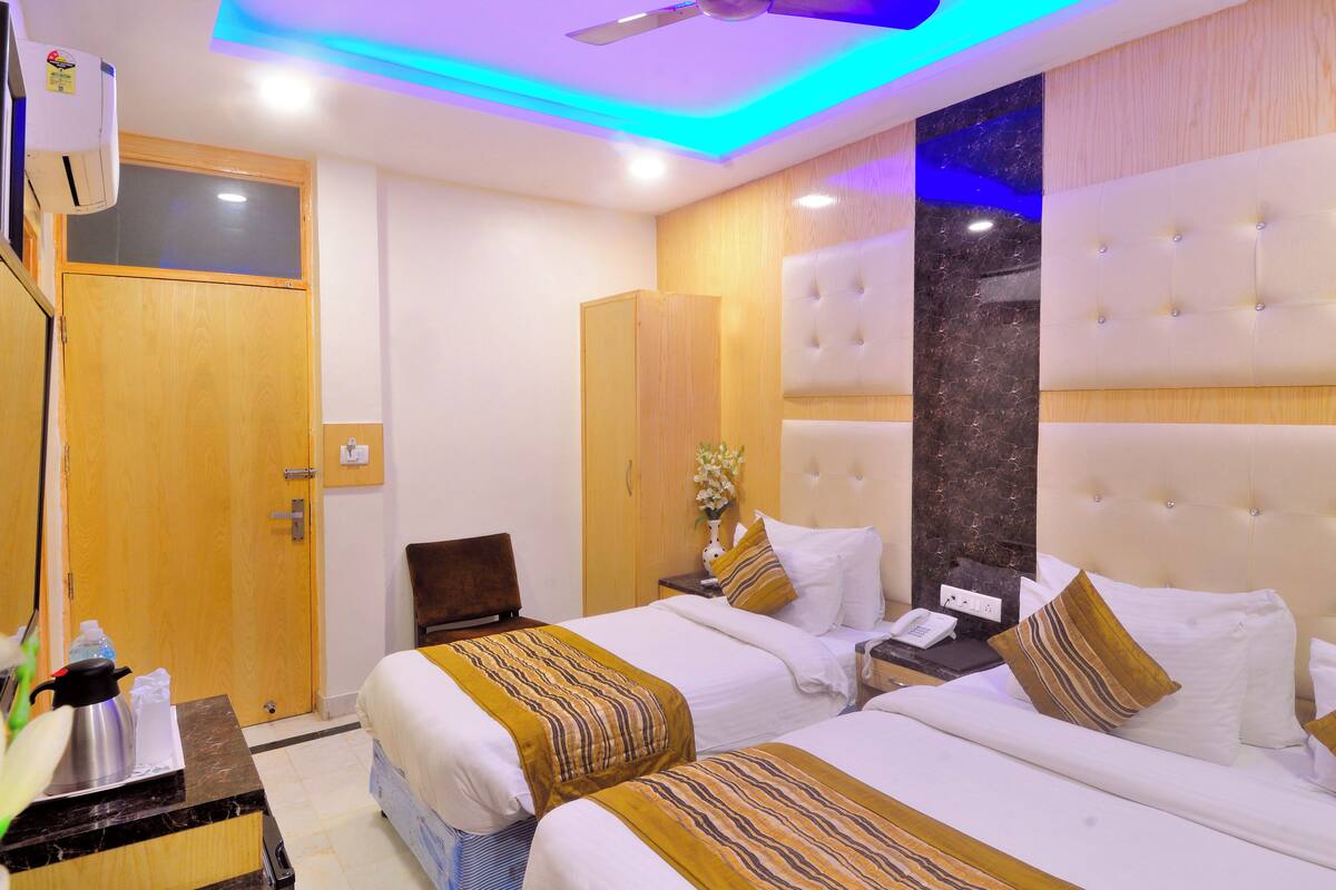 Deluxe Triple Room | WiFi (無料)、ベッドシーツ